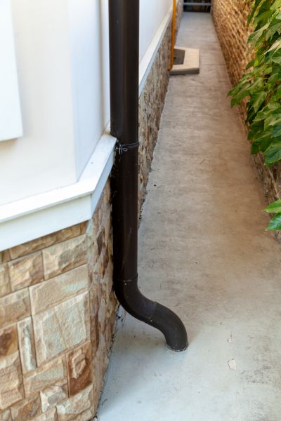 Cost of Underground Gutter Service in Hopkins