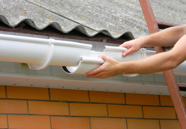 Cost of Gutter Hanging in Hopkins
